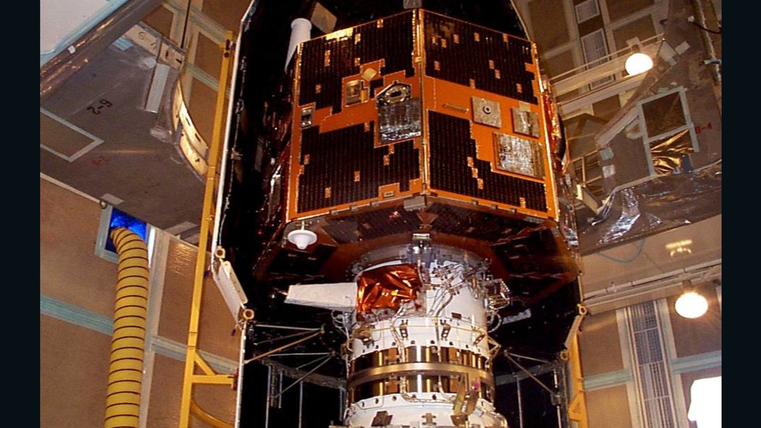 The IMAGE spacecraft is seen undergoing launch preparations in early 2000.