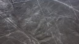 FILE - This Dec. 8, 2014 file photo shows an aerial view of the condor geoglyph in the Nazca desert, in southern Peru. Authorities in Peru detained a truck driver accused of damaging part of the world-renowned Nazca lines. The nation's Ministry of Culture says Jainer Flores drove into an unauthorized section of the U.N. World Heritage site on Saturday, Jan. 27, 2018, leaving tracks and damaging part of three lines. (AP Photo/Rodrigo Abd, File)