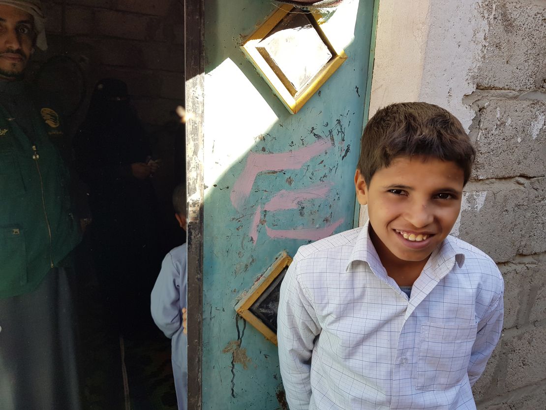 Naji, 13, says that as a child soldier he was tasked with dragging dead bodies from the battlefield.
