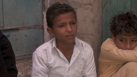 Younis, 13, says he learned to use a machine gun as a young chid. 