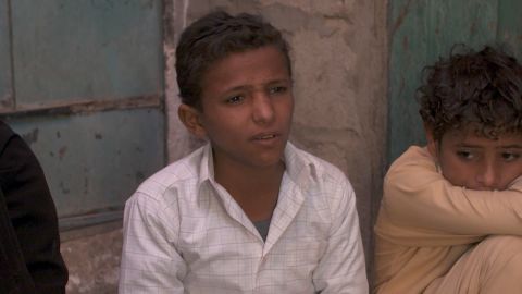 Younis, 13, says he learned to use a machine gun as a young chid.