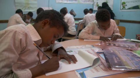 Boys at the rehabilitation center for former child soldiers sketch their memories.
