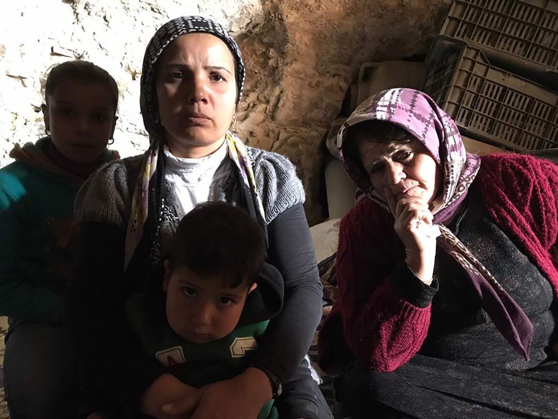 Fatima Muhammed (right), is sheltering in a cave with about a dozen others.