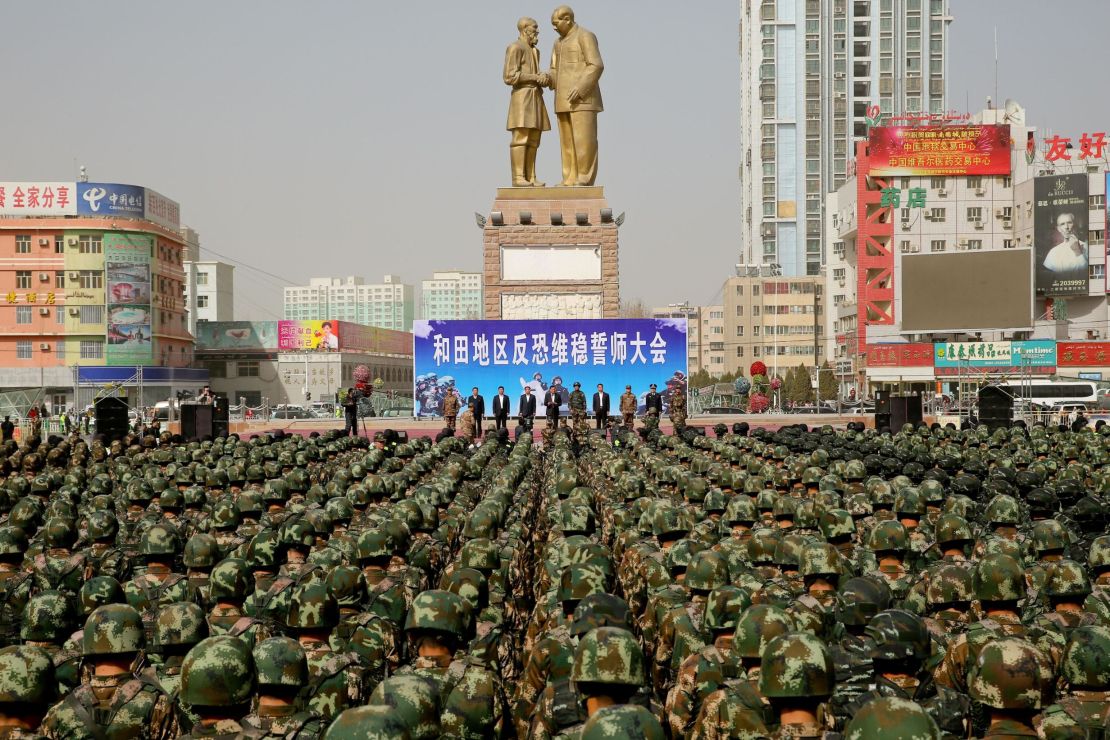 This photo taken on February 27, 2017 shows Chinese military police attending an anti-terrorist oath-taking rally in Hetian, northwest China's Xinjiang Uighur Autonomous Region. 