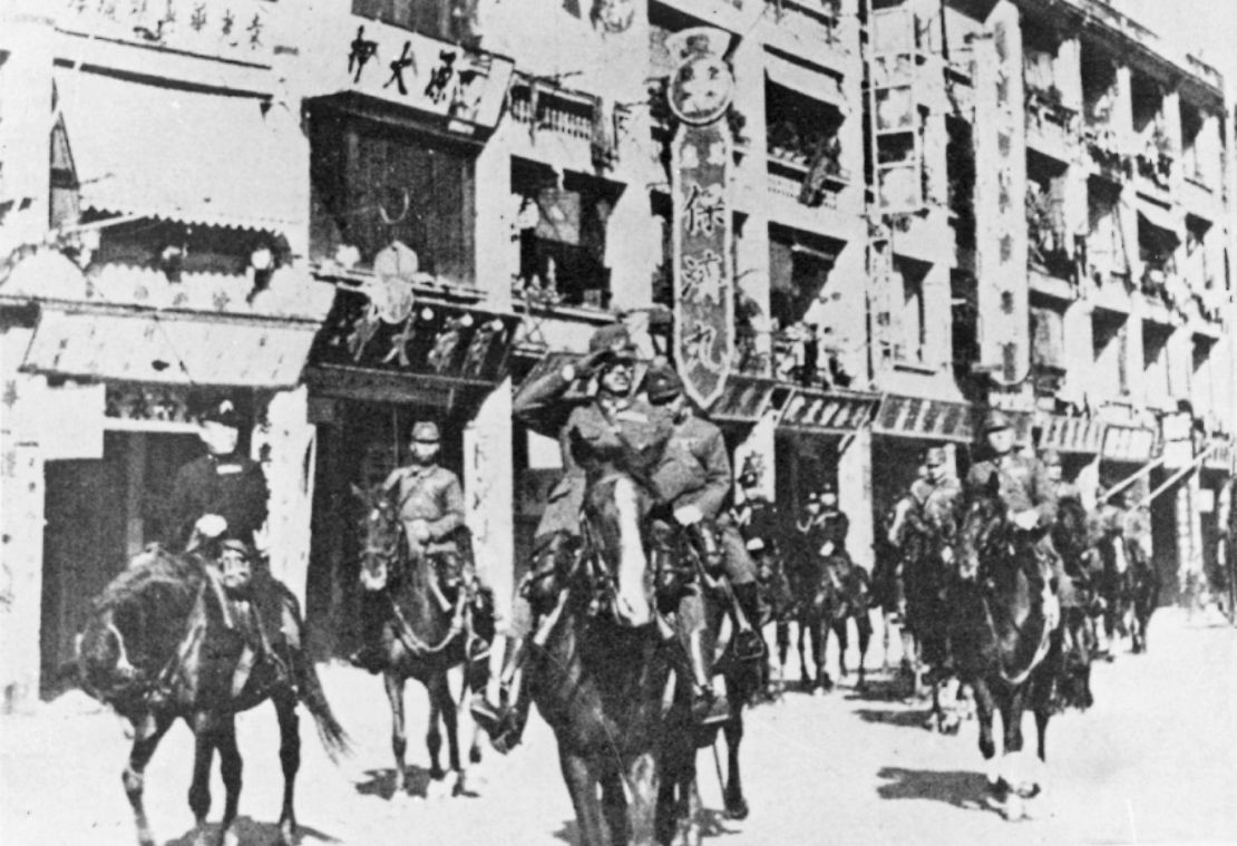 Japanese troops parade through defeated Hong Kong in 1941.