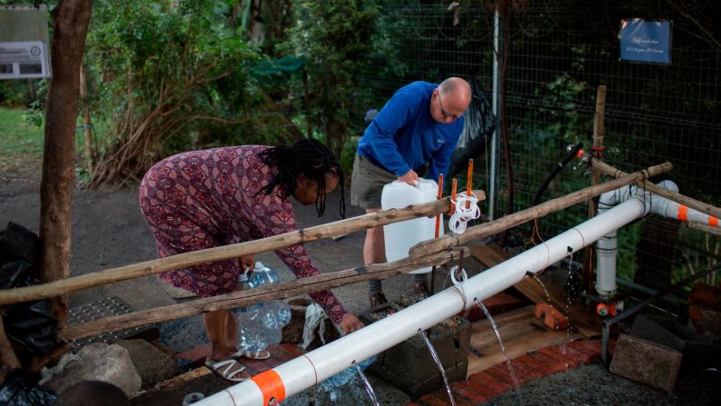 People collect water on February 1.