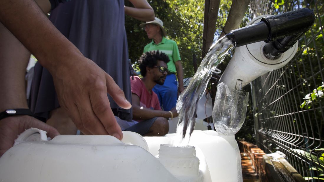 Cape Town residents fill water containers on February 1.