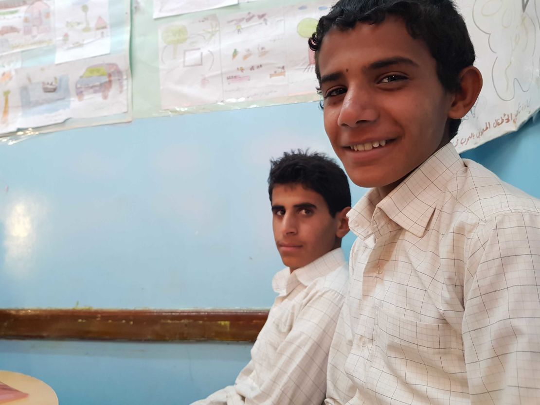 Saleh, right, says he used to drive rocket launchers to the front at the age of 13.