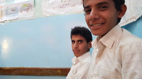 Saleh, right, says he used to drive rocket launchers to the front at the age of 13. 