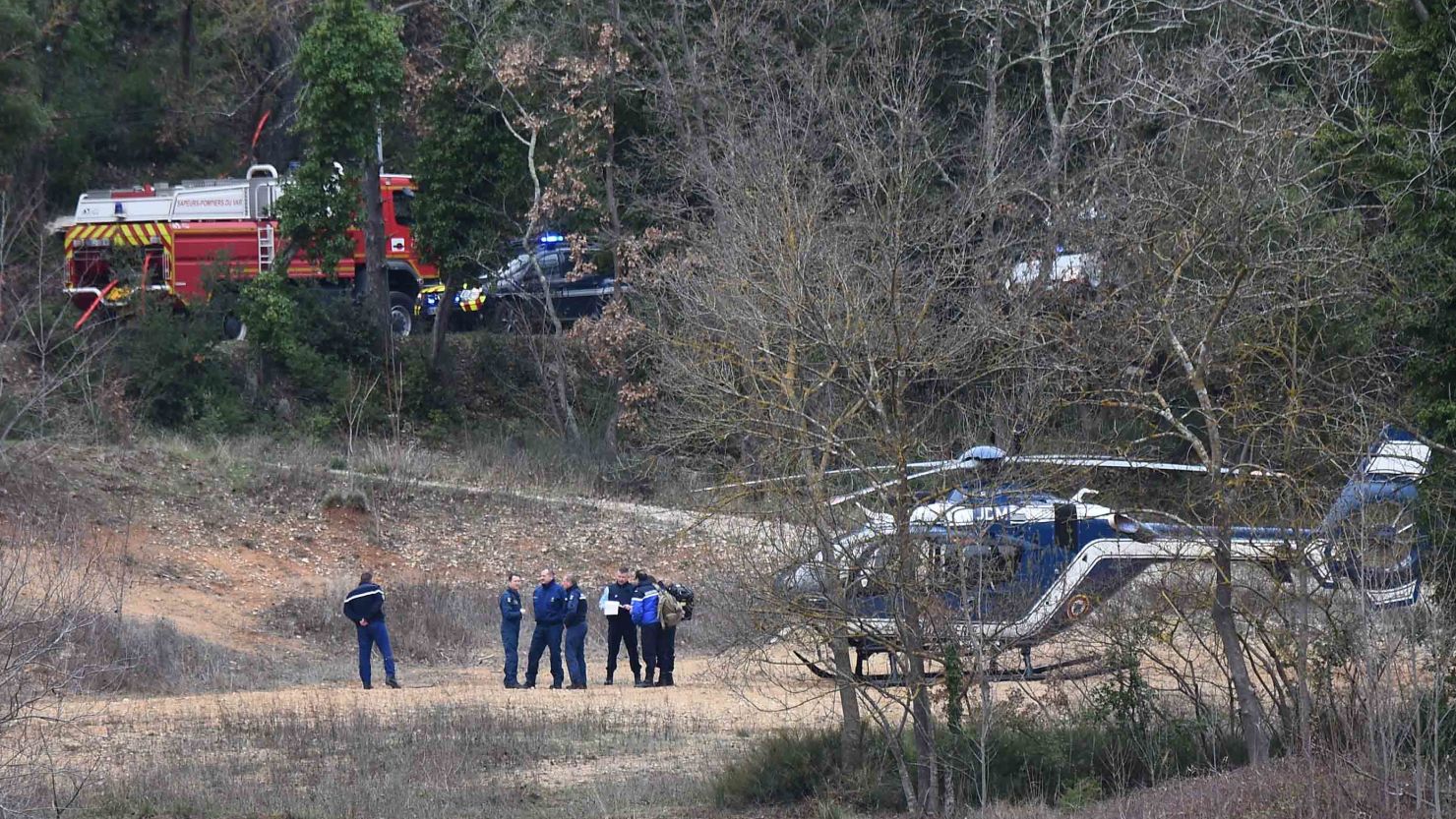 Emergency services work at the site of the accident near Carces lake in southern France Friday.