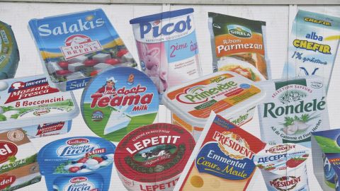 A picture taken on January 12, 2018 shows products painted on a wall of the headquarters of French dairy group Lactalis.