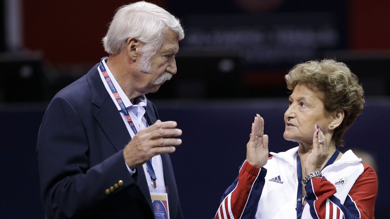 Husband and wife Bela and Martha Karolyi talk before the US women's Olympic gymnastics trials in 2012.