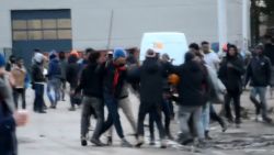 RESTRICTED calais migrants brawl