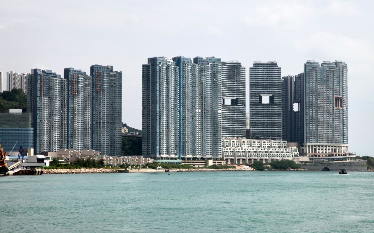 Bel-Air on the Peak (far right), completed in 2008, comprises eight towers located by the waterfront in the Pok Fu Lam neighborhood. The holes were designed so they wouldn't block the views.