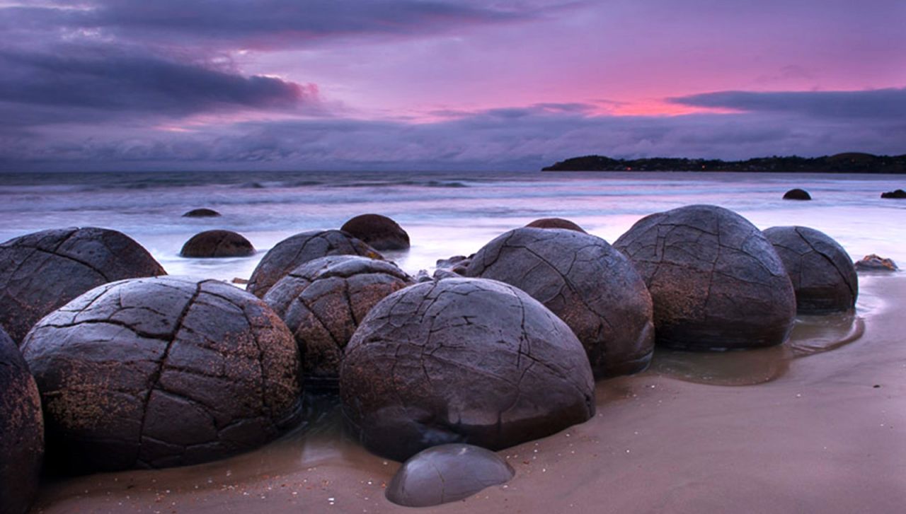<strong>Moeraki, Otago: </strong>The sands of Moeraki are famous for a group of large spherical boulders, located along Koekohe Beach, which were formed from ancient sea sediments millions of years ago.