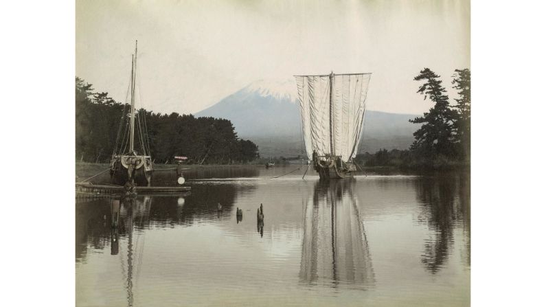 <strong>5. Toward the Far East and Australia:</strong> Opened to foreigners in 1853, there was little tourism in Japan during the "Golden Age" of travel. Here, a junk sails the Bay of Suruga with Mount Fuji in the background. 