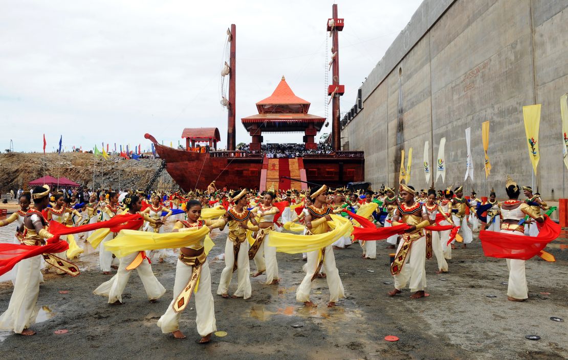 Sri Lankan dancers perform at the site of the Hambantota port during a ceremony marking the first phase of construction, August 15, 2010. 