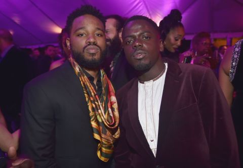 Writer/director Ryan Coogler (left) in a black suit with a colorful scarf and Get Out star Daniel Kaluuya.