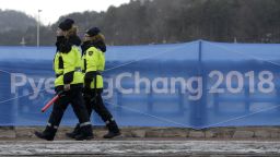 Security workers patrol the Alpensia resort at the 2018 Winter Olympics in Pyeongchang, South Korea, Friday, Feb. 2, 2018. (AP Photo/Charlie Riedel)