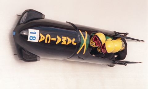 The Jamaican four-man bobsled speeds down the track during the first run of the men's competition 27 February 1988 at the Calgary Winter Olympic Games. 