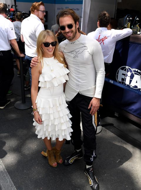 Pop singer Kylie Minogue shared a moment with Frenchman Jean-Eric Verge -- who races for Chinese team Techeetah --  ahead of his fourth round victory in Santiago, Chile on February 3, 2018.  