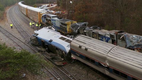 Authorities investigate the scene of a fatal Amtrak train crash in Cayce, South Carolina. 