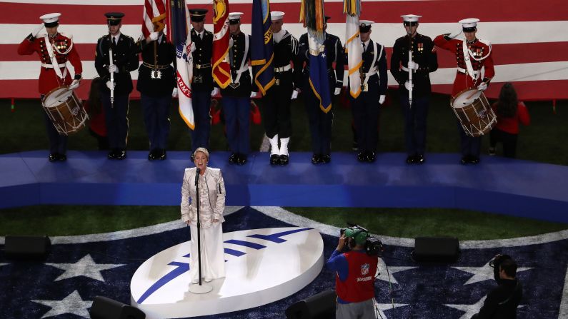 Pink sings the National Anthem before the game.