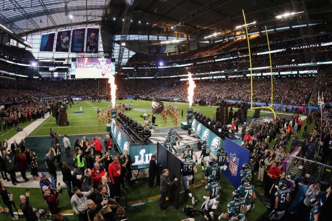 The Eagles take the field before the game.