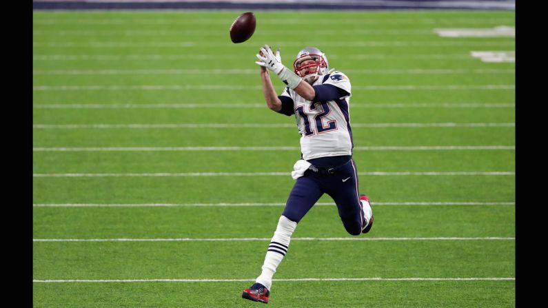 Brady drops a pass during a trick play in the second quarter.
