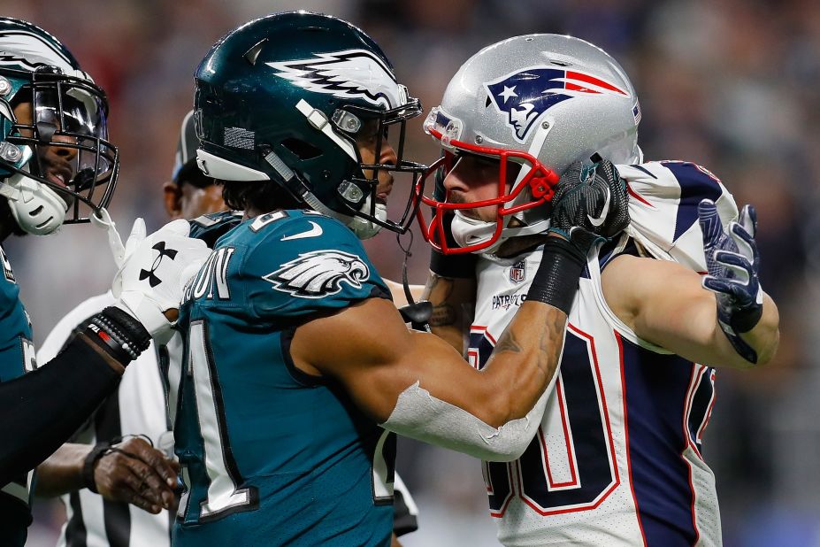 Amendola and Philadelphia's Patrick Robinson exchange words after a whistle.