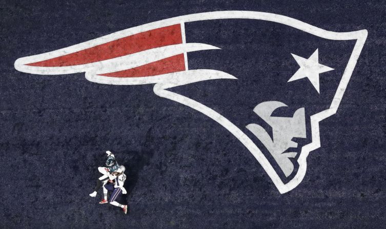 Blount falls into the end zone on his touchdown run. Blount won a Super Bowl with the Patriots last year.