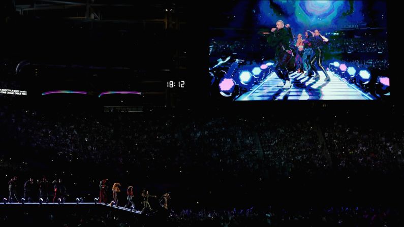 Timberlake is seen on a video screen during the live performance.