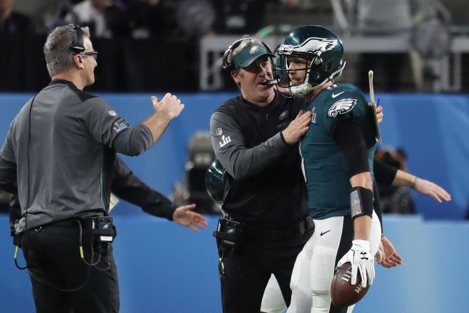 Foles is congratulated by his head coach after the quarterback caught a 1-yard touchdown late in the first half. The touchdown came on a 4th-and-goal trick play.