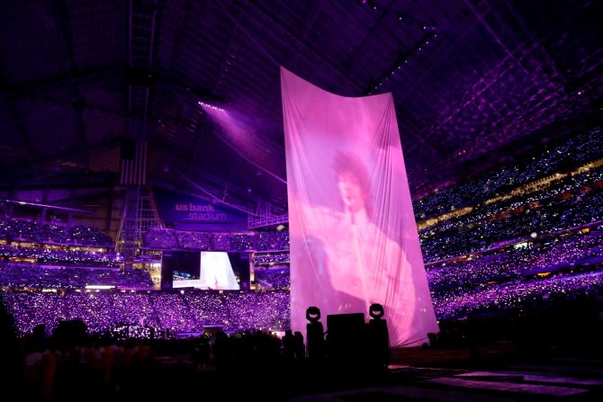 Video of the late singer Prince, a Minneapolis native, can be seen above the stage as Timberlake pays homage to him.