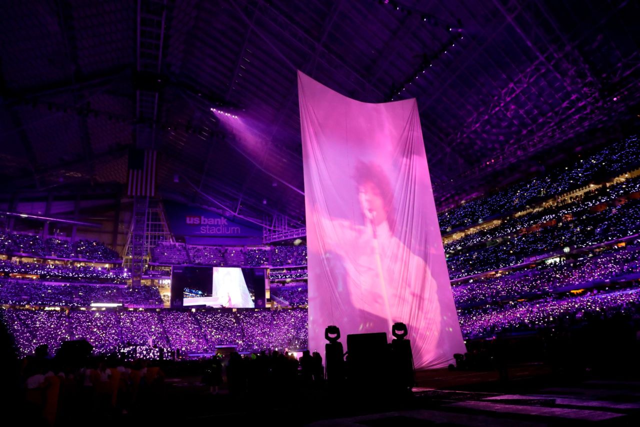 Video of the late singer Prince, a Minneapolis native, can be seen above the stage as Timberlake pays homage to him.