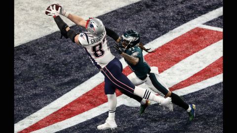 New England tight end Rob Gronkowski reaches for his second touchdown catch of the game. After the extra point, the Patriots took a 33-32 lead in the fourth quarter. It was their first and only lead of the game.