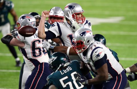 Brady fumbled the ball after a hit by Philadelphia's Brandon Graham, not pictured. Philadelphia added a field goal after the turnover, and that made the score 41-33.