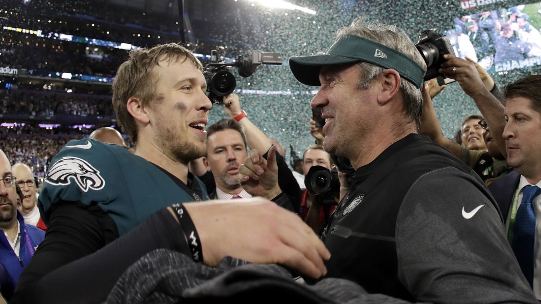 Foles celebrates with head coach Doug Pederson after the game. Foles passed for 373 yards and three touchdowns, and he also caught a touchdown pass. And he wasn't even the team's starter for most of the season. He took over late in the year when Carson Wentz got injured.