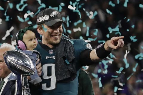 Philadelphia Eagles quarterback Nick Foles holds his daughter, Lily, after the Eagles won the Super Bowl on Sunday, February 4. Foles was named the most valuable player of the game, which the Eagles won 41-33 over the New England Patriots. It is the franchise's first Super Bowl victory.