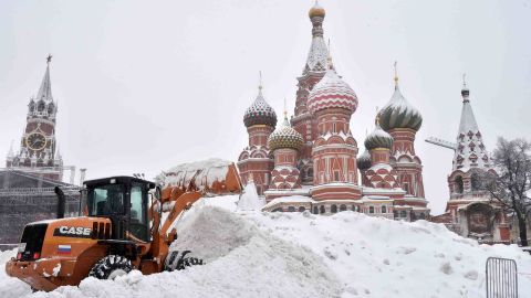A bulldozer plows through snow in Red Square in Moscow on Sunday, February 4.