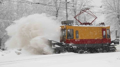 A tramway track is cleared of snow.