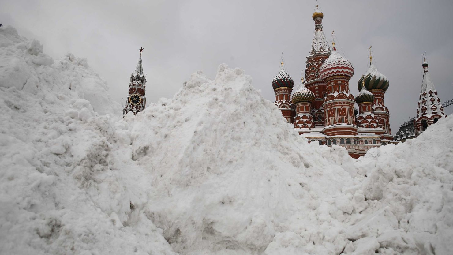 Snow blankets Red Square in Moscow on Monday, February 5, causing delayed flights and power cuts.