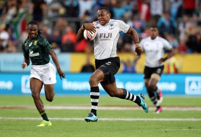 Fiji overturned a first-half deficit against South Africa to <a href="index.php?page=&url=https%3A%2F%2Fedition.cnn.com%2F2018%2F02%2F05%2Fsport%2Fhamilton-rugby-sevens-fiji-south-africa%2Findex.html">claim a first title of the season</a> in Hamilton -- the first time the town has hosted a Sevens World Series tournament after the New Zealand leg was moved from Wellington.