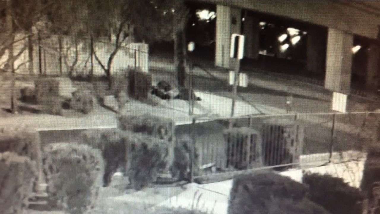 A surveillance camera captured footage of this homeless man sleeping on the sidewalk on February 2. Later a man gets out of an SUV and shoots him.