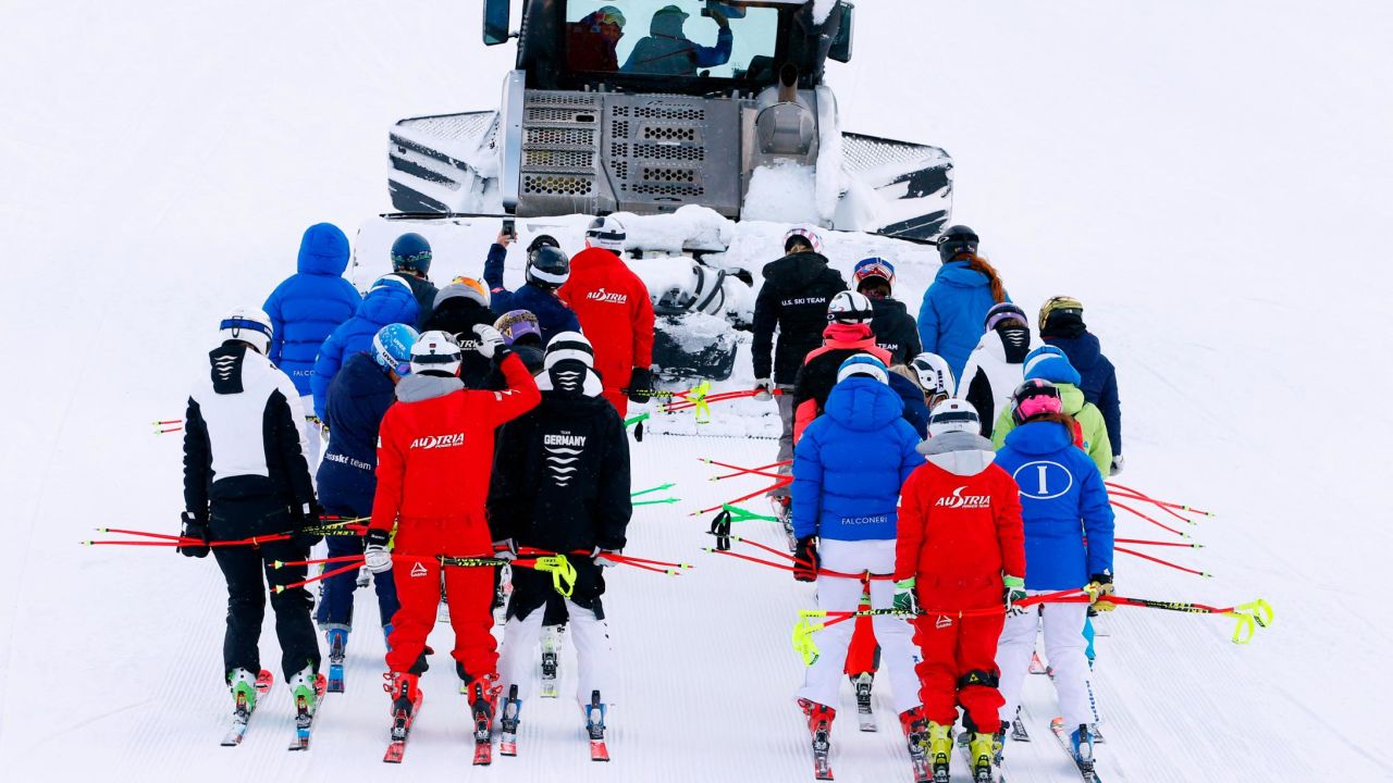 Teams go to inspects the course at Lake Louise.