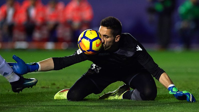 Levante goalkeeper Oier Olazabal gets hit in the face with the ball during a Spanish league match in Valencia on Saturday, February 3.