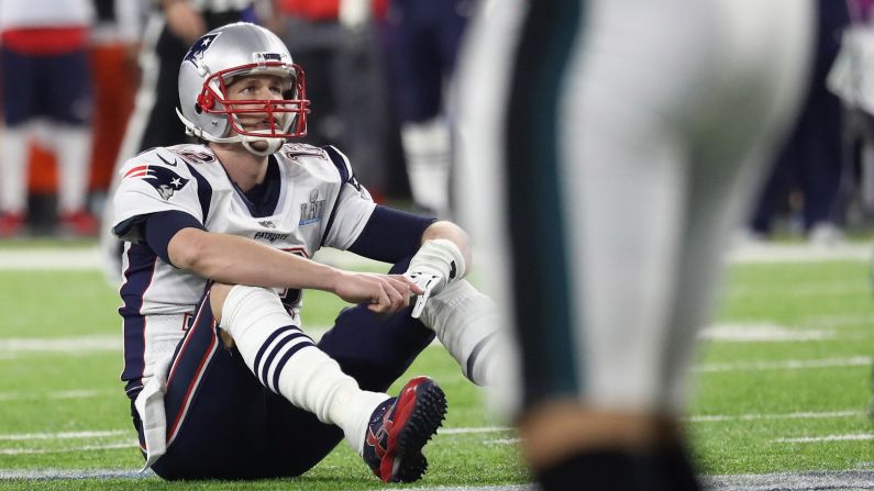 New England quarterback Tom Brady reacts after fumbling the ball late in the <a  target="_blank">Super Bowl</a> on Sunday, February 4. Brady threw for 505 yards in the game -- <a  target="_blank">a Super Bowl record</a> -- but still came up short of winning his sixth NFL title.