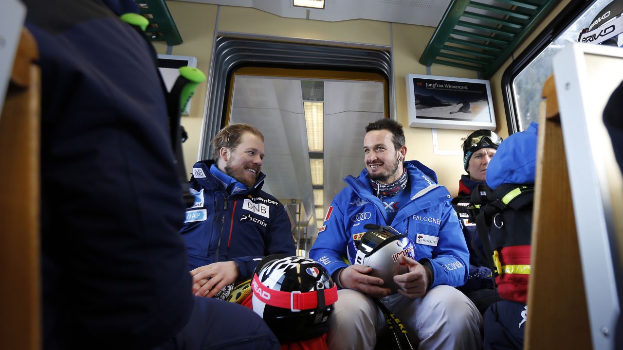 Jansrud (left) shares a joke with Dominik Paris of Italy.