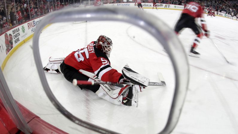 New Jersey goalie Ken Appleby stretches prior to an NHL game in Newark, New Jersey, on Saturday, February 3.