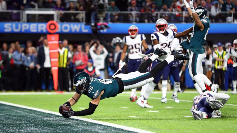 Philadelphia tight end Zach Ertz dives for the goal line, scoring a fourth-quarter touchdown to give the Eagles a 38-33 lead in the Super Bowl on Sunday, February 4.